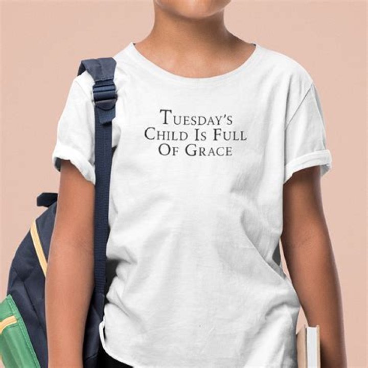 What is the meaning of Tuesday's child is full of grace?